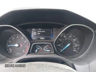 2015 Ford Focus SE with VIN 1FADP3K27FL387012, listed as a IAAI auction lot 42100945 with 85,588 mi miles. Bid and sale history available at carsss.com. Image 7.