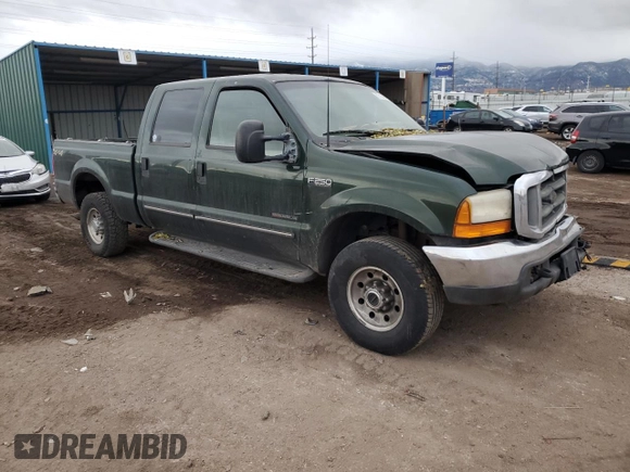 2000 Ford F-250 XL with VIN 1FTNW21F5YEB21513, listed as a Copart auction lot 82013464 with 383,819 mi miles and Salvage title. Bid and sale history available at DreamBid. Image 4.