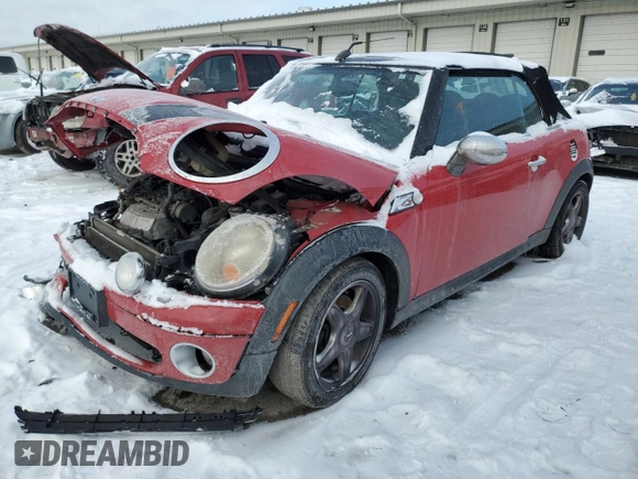 2010 MINI Convertible with VIN WMWMR3C57ATU97979, listed as a Copart auction lot 45903855 with 154,614 mi miles and Salvage Title. Bid and sale history available at DreamBid. Image 1.