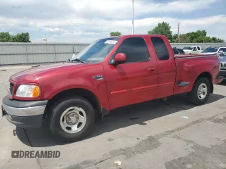 1999 Ford F-150 with VIN 1FTRX07WXXKC05997, listed as a Copart auction lot 61214615 with 222,687 mi miles and Salvage title. Bid and sale history available at DreamBid. Image 1.