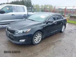 2015 Kia Optima EX with VIN 5XXGN4A71FG391444, listed as a IAAI auction lot 41991844 with 126,197 mi miles. Bid and sale history available at carsss.com. Image 2.