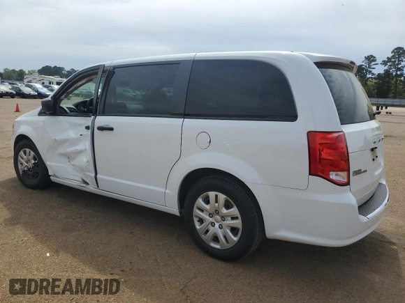 2020 Dodge Grand Caravan SE with VIN 2C4RDGBG3LR222072, listed as a Copart auction lot 50966545 with 128,241 mi miles and Salvage Title. Bid and sale history available at DreamBid. Image 2.