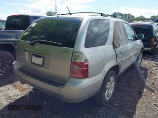 2004 Acura MDX Touring Pkg with VIN 2HNYD18664H517854, listed as a IAAI auction lot 41979134 with 144,713 mi miles. Bid and sale history available at carsss.com. Image 4.