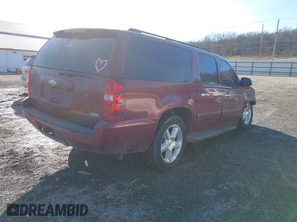 2008 Chevrolet Suburban LT w/3LT with VIN 1GNFK16358J211719, listed as a IAAI auction lot 41654527 with 194,985 mi miles. Bid and sale history available at carsss.com. Image 4.
