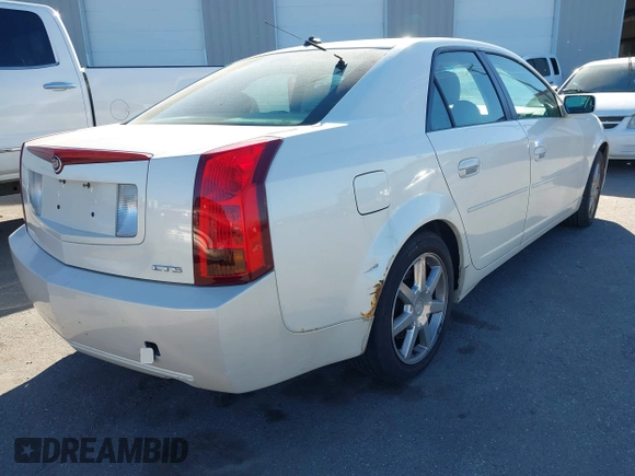 2004 Cadillac CTS with VIN 1G6DM577140186842, listed as a IAAI auction lot 41824732 with 151,858 mi miles. Bid and sale history available at carsss.com. Image 4.