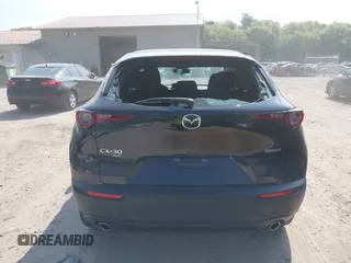 2021 Mazda CX-30 S with VIN 3MVDMBAL6MM264948, listed as a IAAI auction lot 42263077 with 13,614 mi miles and . Bid and sale history available at DreamBid. Image 16.