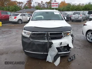 2015 Dodge Durango SXT with VIN 1C4RDJAG8FC239977, listed as a IAAI auction lot 40764725 with 133,809 mi miles and . Bid and sale history available at carsss.com. Image 13.