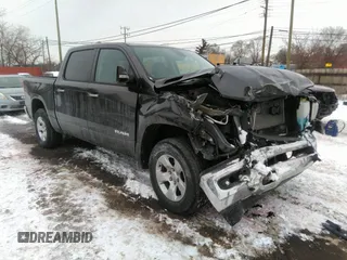 2019 Ram 1500 Big Horn z VIN 1C6RRFFG2KN904627, wystawiony jako IAAI lot #41581062 z przebiegiem 54 840 mil mil oraz . Historia ofert i sprzedaży dostępna na DreamBid. Obrazek 1.