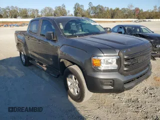 2017 GMC Canyon 2WD with VIN 1GTG5BEA7H1227043, listed as a Copart auction lot 77062374 with 101,338 mi miles and Salvage Title. Bid and sale history available at carsss.com. Image 4.