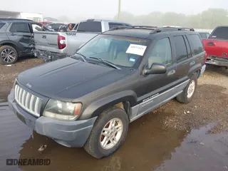 2004 Jeep Grand Cherokee Laredo with VIN 1J4GX48N74C385749, listed as a IAAI auction lot 41877421 with 141,255 mi miles. Bid and sale history available at carsss.com. Image 2.