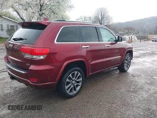 2017 Jeep Grand Cherokee Overland with VIN 1C4RJFCG5HC854024, listed as a IAAI auction lot 42006307 with 118,640 mi miles. Bid and sale history available at carsss.com. Image 4.