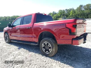 2023 Ford F-150 Lightning Pro z VIN 1FTVW1EL5PWG08844, wystawiony jako Copart lot #57673505 z przebiegiem 20 001 mil mil oraz Szkoda całkowita • Salvage title. Historia ofert i sprzedaży dostępna na DreamBid. Obrazek 2.