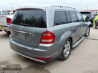 2011 Mercedes-Benz GL-Class GL 450 with VIN 4JGBF7BEXBA627886, listed as a IAAI auction lot 41957995 with 162,449 mi miles. Bid and sale history available at carsss.com. Image 4.