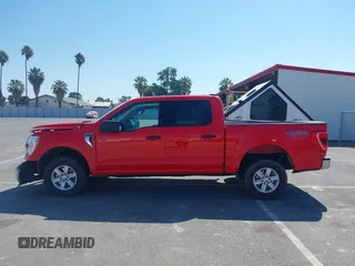 2021 Ford F-150 XL with VIN 1FTFW1E56MKD86209, listed as a IAAI auction lot 42700594 with 120,972 mi miles and . Bid and sale history available at DreamBid. Image 14.
