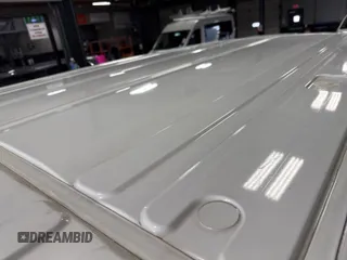 2020 Ford Transit Cargo z VIN 1FTBR2YG5LKA32432, wystawiony jako IAAI lot #42493895 z przebiegiem 134 672 mil mil oraz . Historia ofert i sprzedaży dostępna na DreamBid. Obrazek 21.