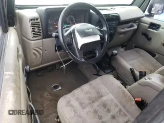 2005 Jeep Wrangler Sport z VIN 1J4FA49S55P334844, wystawiony jako Copart lot #52026835 z przebiegiem 209 216 mil mil oraz Czysty tytuł • Clean title. Historia ofert i sprzedaży dostępna na DreamBid. Obrazek 8.