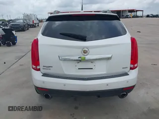 2014 Cadillac SRX Premium Collection with VIN 3GYFNDE31ES615995, listed as a IAAI auction lot 42148943 with 232,752 mi miles and . Bid and sale history available at DreamBid. Image 16.