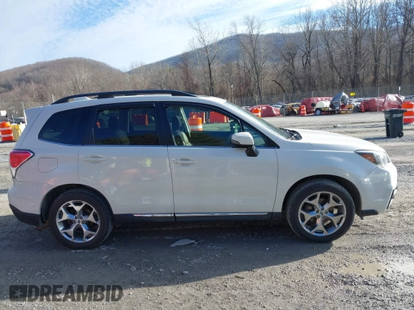 2017 Subaru Forester Touring with VIN JF2SJAWC0HH550052, listed as a IAAI auction lot 41475102 with 115,600 mi miles and . Bid and sale history available at DreamBid. Image 13.