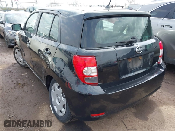2010 Scion xD with VIN JTKKU4B46AJ053780, listed as a IAAI auction lot 41932064 with 106,330 mi miles. Bid and sale history available at carsss.com. Image 3.