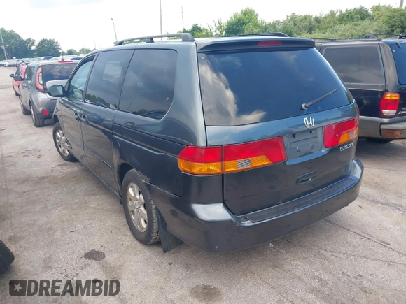 2004 Honda Odyssey EX-L with VIN 5FNRL189X4B045459, listed as a IAAI auction lot 42628246 with 181,328 mi miles and . Bid and sale history available at DreamBid. Image 3.