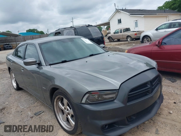 2012 Dodge Charger RT with VIN 2C3CDXCT5CH225051, listed as a IAAI auction lot 42150597 with 241,655 mi miles and . Bid and sale history available at carsss.com. Image 1.