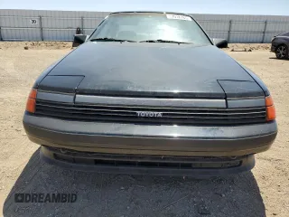 1989 Toyota Celica z VIN JT2ST67C8K7337876, wystawiony jako Copart lot #57918785 z przebiegiem 16 862 mil mil oraz Tytuł czysty. Historia ofert i sprzedaży dostępna na DreamBid. Obrazek 5.
