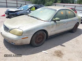 2004 Mercury Sable GS with VIN 1MEFM50U34G613319, listed as a IAAI auction lot 42800731 with 208,865 mi miles and . Bid and sale history available at DreamBid. Image 2.