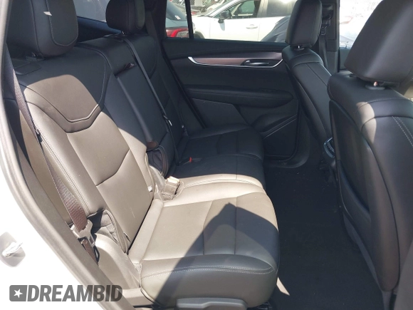 2023 Cadillac XT6 FWD Luxury z VIN 1GYKPAR4XPZ182533, wystawiony jako IAAI lot #42078937 z przebiegiem 31 248 mil mil oraz . Historia ofert i sprzedaży dostępna na DreamBid. Obrazek 8.
