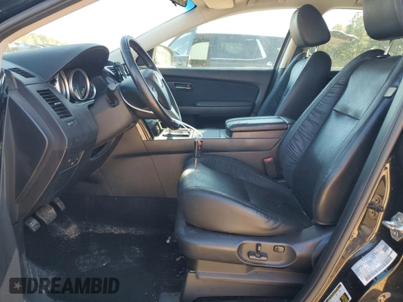 2015 Mazda CX-9 Touring with VIN JM3TB2CA8F0457856, listed as a Copart auction lot 48626525 with 114,459 mi miles and Salvage Title. Bid and sale history available at DreamBid. Image 7.