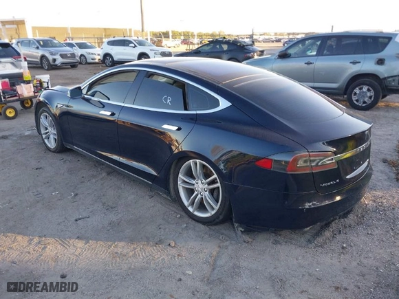 2013 Tesla Model S with VIN 5YJSA1DN9DFP06165, listed as a IAAI auction lot 40920844 with 181,342 mi miles. Bid and sale history available at carsss.com. Image 3.