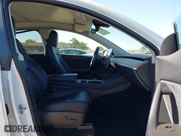 2022 Tesla Model Y Long Range with VIN 7SAYGDEE1NF364241, listed as a IAAI auction lot 42190272 with 54,878 mi miles and . Bid and sale history available at DreamBid. Image 5.