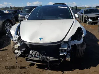 2023 Tesla Model 3 with VIN 5YJ3E1EA9PF558527, listed as a Copart auction lot 48754535 with 21,801 mi miles and Salvage Title. Bid and sale history available at DreamBid. Image 5.