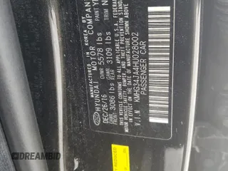 2017 Genesis G90 Premium z VIN KMHG34JA4HU028002, wystawiony jako Copart lot #54210265 z przebiegiem 161 194 mil mil oraz Szkody całkowita. Historia ofert i sprzedaży dostępna na DreamBid. Obrazek 13.