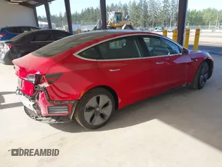 2020 Tesla Model 3 Standard Range Plus z VIN 5YJ3E1EA7LF611669, wystawiony jako IAAI lot #42179974 z przebiegiem 17 696 mil mil oraz . Historia ofert i sprzedaży dostępna na DreamBid. Obrazek 4.