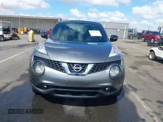 2015 Nissan Juke S with VIN JN8AF5MRXFT513258, listed as a IAAI auction lot 42213721 with 91,972 mi miles and . Bid and sale history available at DreamBid. Image 12.