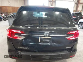 2021 Honda Odyssey Touring z VIN 5FNRL6H83MB028264, wystawiony jako IAAI lot #42206204 z przebiegiem 45 332 mil mil oraz . Historia ofert i sprzedaży dostępna na DreamBid. Obrazek 6.