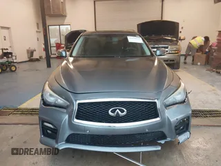 2014 Infiniti Q50 Premium z VIN JN1BV7AR7EM696486, wystawiony jako IAAI lot #41976047 z przebiegiem 145 000 mil mil oraz . Historia ofert i sprzedaży dostępna na DreamBid. Obrazek 11.