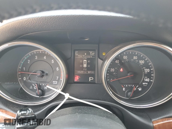 2012 Jeep Grand Cherokee Limited z VIN 1C4RJFBT0CC287342, wystawiony jako Copart lot #57000525 z przebiegiem 135 655 mil mil oraz Szkoda całkowita • Salvage title. Historia ofert i sprzedaży dostępna na DreamBid. Obrazek 9.