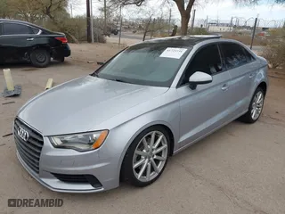 2016 Audi A3 1.8T Premium with VIN WAUA7GFF2G1017615, listed as a IAAI auction lot 41725731 with 70,332 mi miles. Bid and sale history available at carsss.com. Image 2.