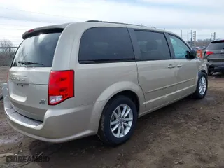 2014 Dodge Grand Caravan SXT 30th Anniversary with VIN 2C4RDGCG5ER122654, listed as a IAAI auction lot 41878917 with 110,418 mi miles. Bid and sale history available at carsss.com. Image 4.