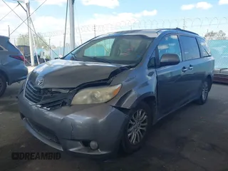 2011 Toyota Sienna XLE AAS with VIN 5TDYK3DC5BS146848, listed as a IAAI auction lot 41914140 with 259,862 mi miles. Bid and sale history available at carsss.com. Image 17.