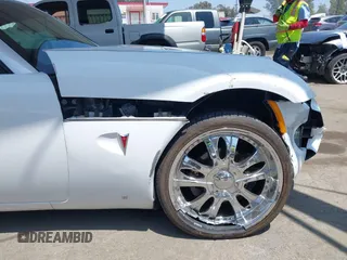 2007 Pontiac Solstice z VIN 1G2MB35B97Y141396, wystawiony jako IAAI lot #42443705 z przebiegiem 118 933 mil mil oraz . Historia ofert i sprzedaży dostępna na DreamBid. Obrazek 12.