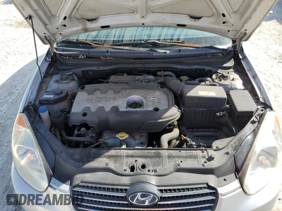2007 Hyundai Accent GL z VIN KMHCN45C77U073194, wystawiony jako Copart lot #42955445 z przebiegiem 248 364 mil mil oraz Nie do naprawy • Non repairable. Historia ofert i sprzedaży dostępna na DreamBid. Obrazek 12.