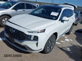 2021 Hyundai Santa Fe Calligraphy with VIN 5NMS5DAL1MH360376, listed as a IAAI auction lot 41395282 with 50,275 mi miles and . Bid and sale history available at DreamBid. Image 2.