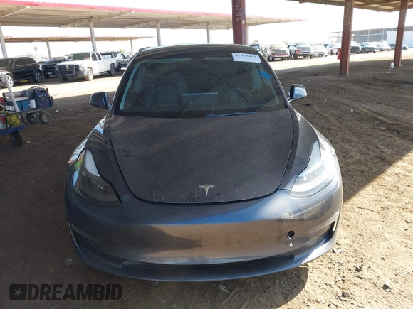 2022 Tesla Model 3 Long Range z VIN 5YJ3E1EB5NF205806, wystawiony jako IAAI lot #42063489 z przebiegiem 63 307 mil mil oraz . Historia ofert i sprzedaży dostępna na DreamBid. Obrazek 12.