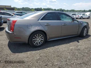 2012 Cadillac CTS Luxury with VIN 1G6DE5E54C0138040, listed as a Copart auction lot 61997305 with 140,996 mi miles and Salvage title. Bid and sale history available at DreamBid. Image 3.