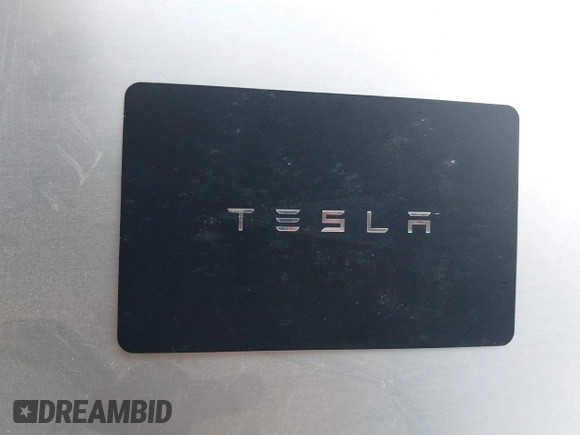 2019 Tesla Model 3 Long Range with VIN 5YJ3E1EB1KF510912, listed as a IAAI auction lot 41857775 with Not Provided miles and . Bid and sale history available at DreamBid. Image 11.