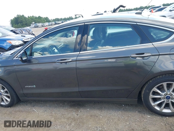 2017 Ford Fusion Hybrid SE z VIN 3FA6P0LU3HR260558, wystawiony jako IAAI lot #42657176 z przebiegiem 161 183 mil mil oraz . Historia ofert i sprzedaży dostępna na DreamBid. Obrazek 15.