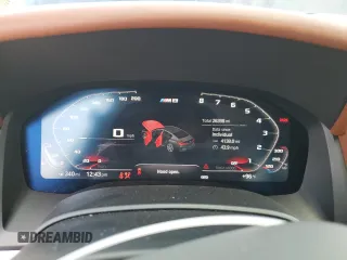 2021 BMW M8 z VIN WBSGV0C05MCF85718, wystawiony jako Copart lot #64518093 z przebiegiem 26 398 mil mil oraz . Historia ofert i sprzedaży dostępna na DreamBid. Obrazek 9.