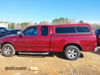 2003 Ford F-150 XL with VIN 1FTRX17W43NA07186, listed as a IAAI auction lot 41864354 with 123,565 mi miles. Bid and sale history available at carsss.com. Image 14.